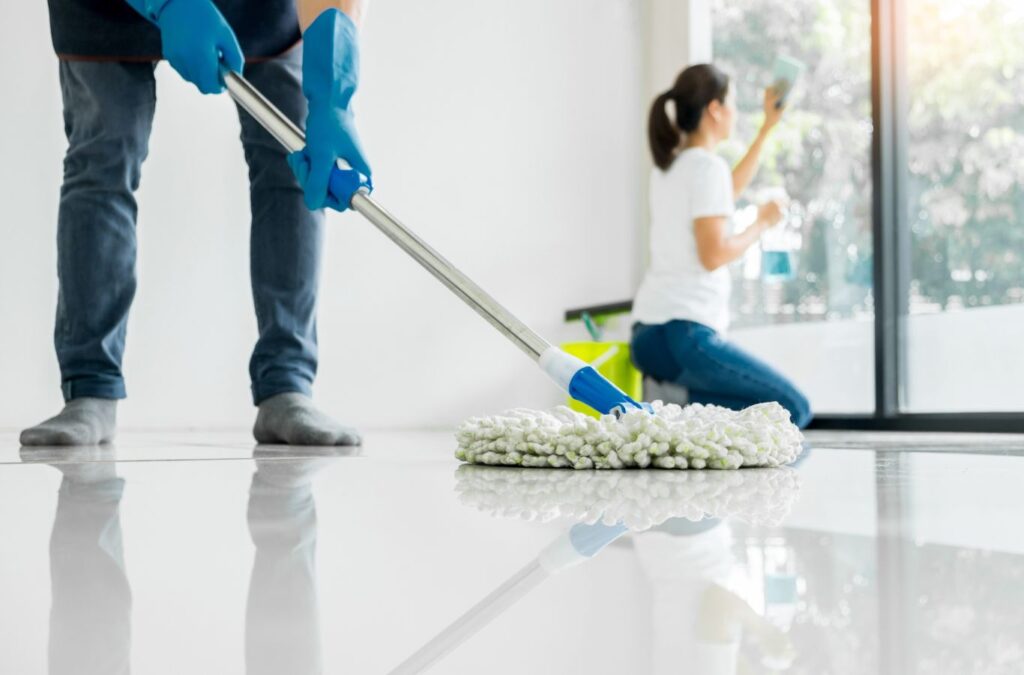 A Tidy Touch Cleaning professional performing deep cleaning services in Cornerstone, AB, ensuring a spotless and sanitized space.